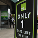 A sign for H&R Block reading Only 1 Days Left to File in front of a H&R Block Shop